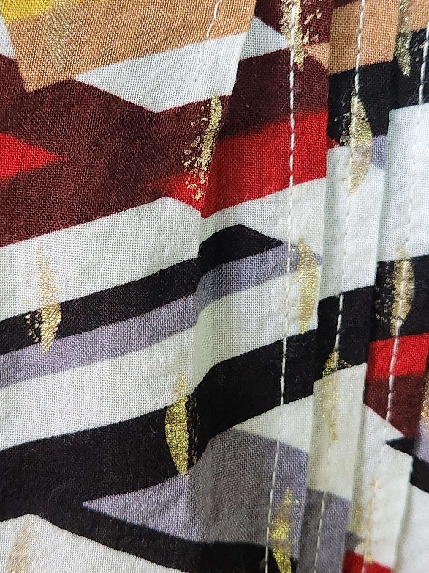 Blouse colorée avec touche de doré Season